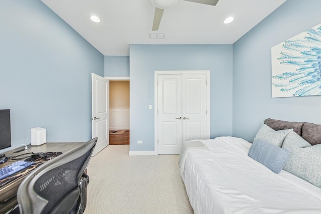 bedroom with recessed lighting, light carpet, visible vents, baseboards, and a closet