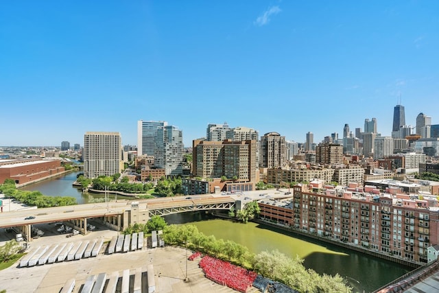 property's view of city featuring a water view