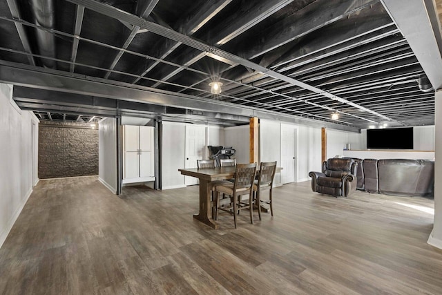 dining area with wood finished floors