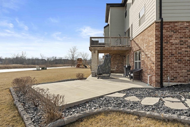 view of patio / terrace featuring a balcony