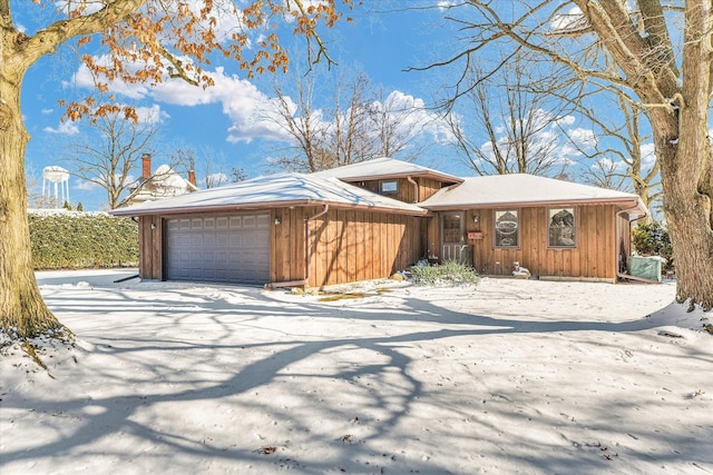 view of front of home featuring an outbuilding