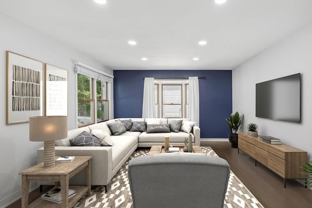 living room with dark wood-type flooring, recessed lighting, a healthy amount of sunlight, and baseboards