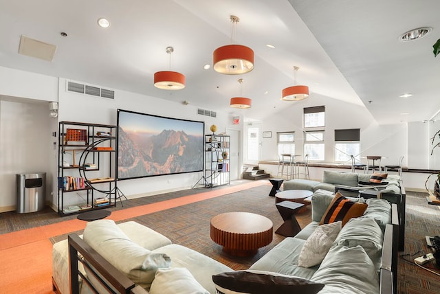 interior space featuring high vaulted ceiling, visible vents, and recessed lighting