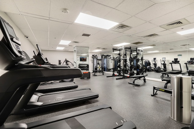 exercise room featuring visible vents and a drop ceiling