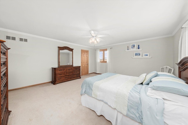 bedroom with visible vents, baseboards, a ceiling fan, carpet, and crown molding