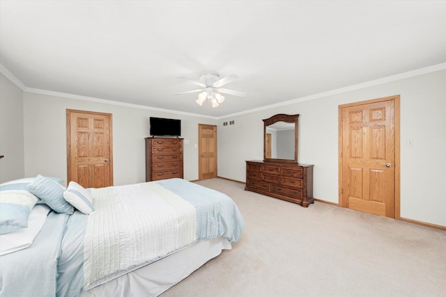 bedroom with ceiling fan, light colored carpet, visible vents, baseboards, and ornamental molding