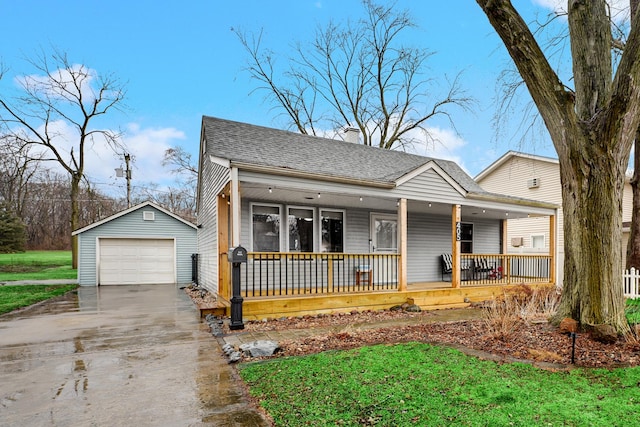 bungalow-style house with a porch, a garage, a shingled roof, an outdoor structure, and driveway