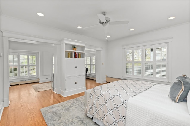 714 Sheridan Rd, Evanston, IL 60202 - bedroom featuring a baseboard radiator, light wood-style floors, recessed lighting, baseboard heating, and ceiling fan