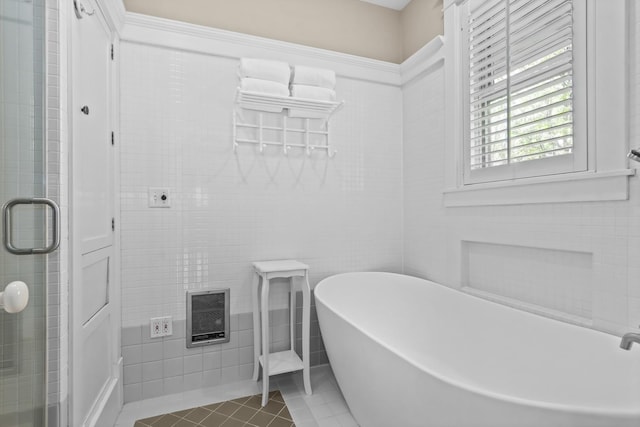 714 Sheridan Rd, Evanston, IL 60202 - full bath featuring a freestanding tub, a stall shower, and tile patterned flooring