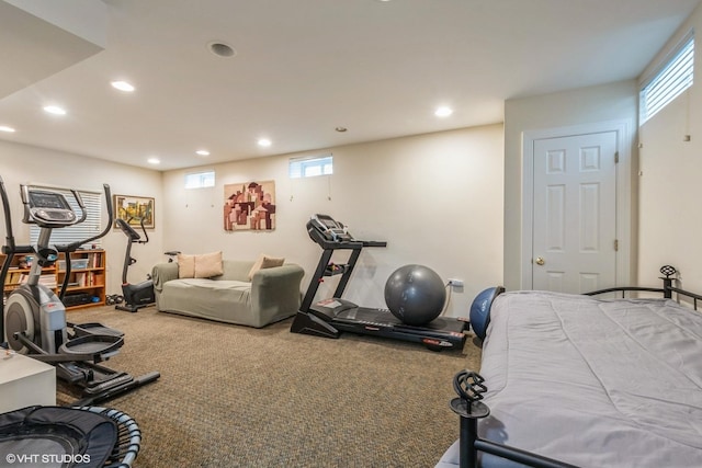 workout area with carpet floors and recessed lighting