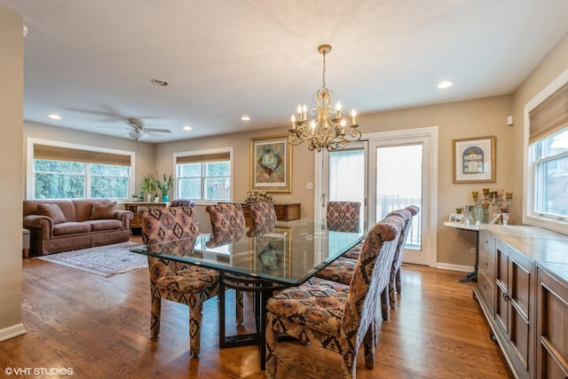 dining room with a wealth of natural light, recessed lighting, and wood finished floors