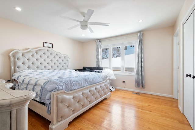 bedroom featuring baseboards, visible vents, a ceiling fan, wood finished floors, and recessed lighting