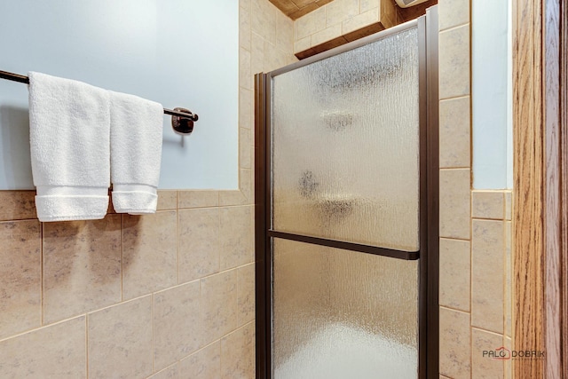 bathroom featuring a stall shower