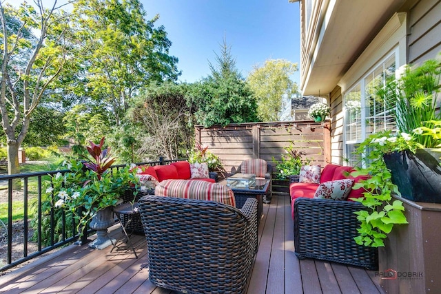 deck featuring outdoor lounge area