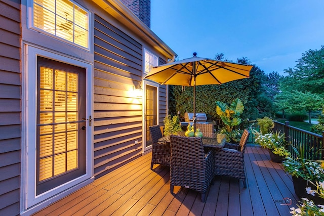 deck featuring outdoor dining space