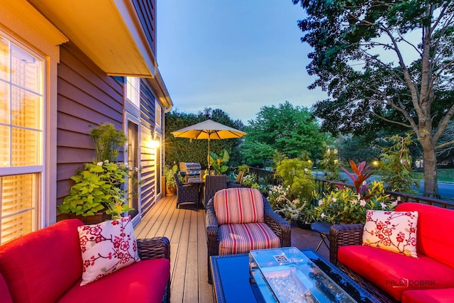 wooden deck with outdoor lounge area