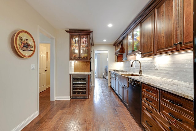 bar with beverage cooler, black dishwasher, dark wood-style floors, and decorative backsplash