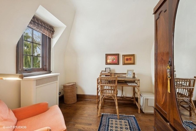 office space featuring dark wood-style flooring and baseboards