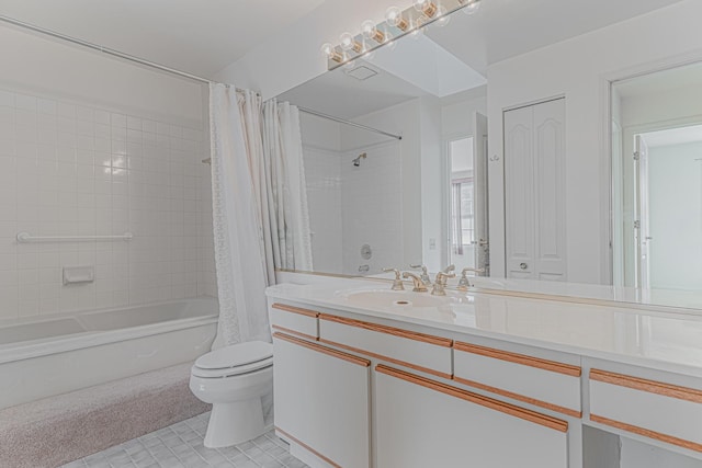 bathroom featuring vanity, toilet, and shower / tub combo