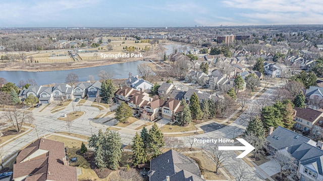 aerial view with a residential view and a water view