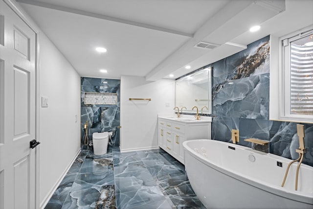 full bath with visible vents, toilet, a soaking tub, marble finish floor, and vanity