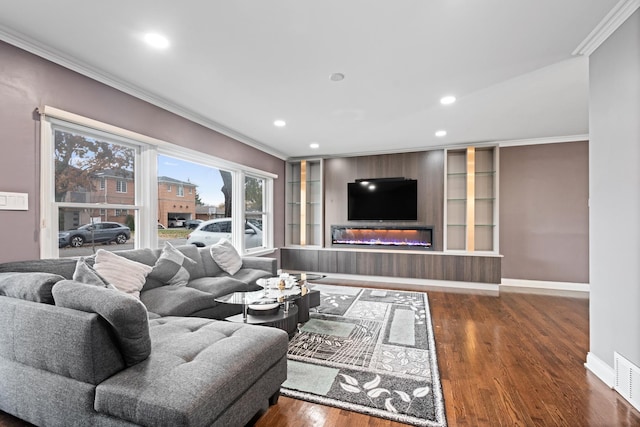 living room featuring recessed lighting, crown molding, and wood finished floors