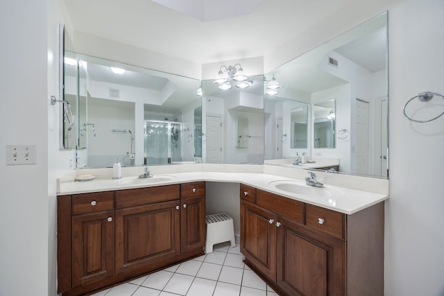 bathroom featuring visible vents, a shower stall, vanity, and tile patterned floors