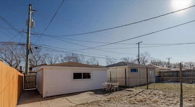 view of outbuilding featuring an outbuilding and a fenced backyard