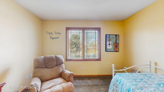 carpeted bedroom with baseboards