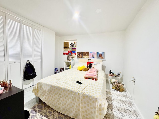 bedroom featuring baseboards