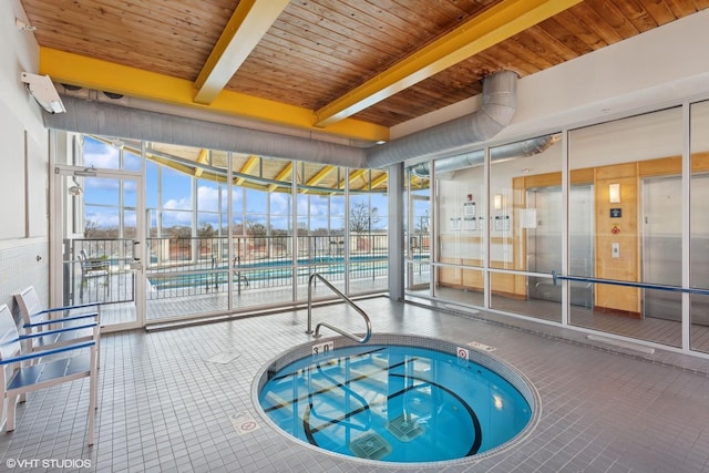 view of pool featuring an indoor in ground hot tub