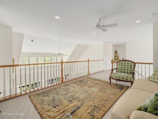 living area with carpet floors and recessed lighting