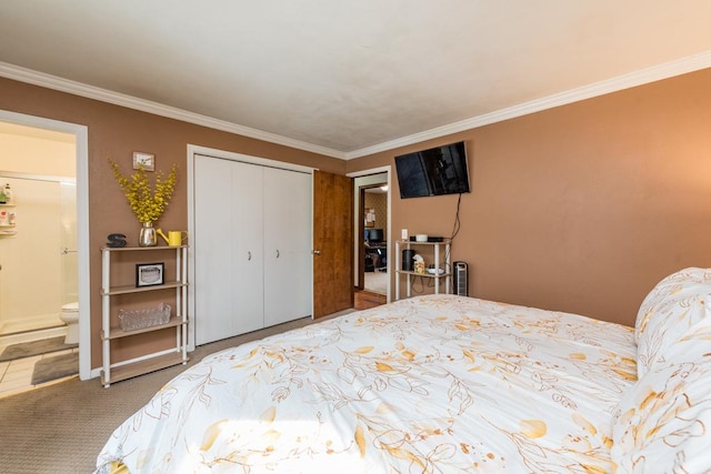 carpeted bedroom with crown molding, a closet, and connected bathroom