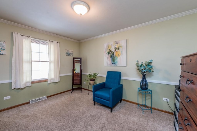 sitting room featuring ornamental molding, carpet, visible vents, and baseboards