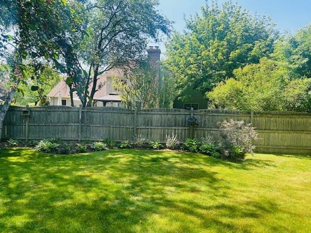 view of yard with fence