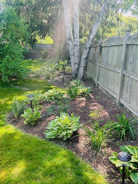 view of yard with fence