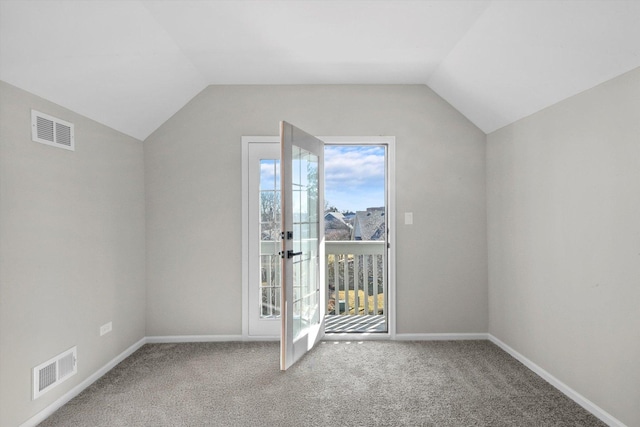 bonus room featuring visible vents, lofted ceiling, and carpet flooring