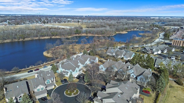 aerial view with a residential view and a water view