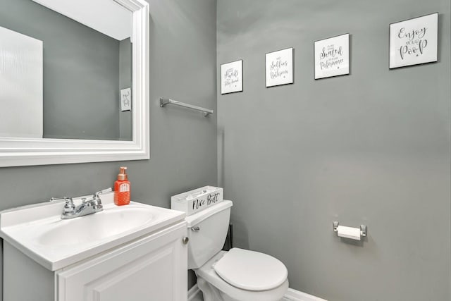 half bath with toilet and vanity