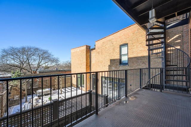 balcony featuring stairs