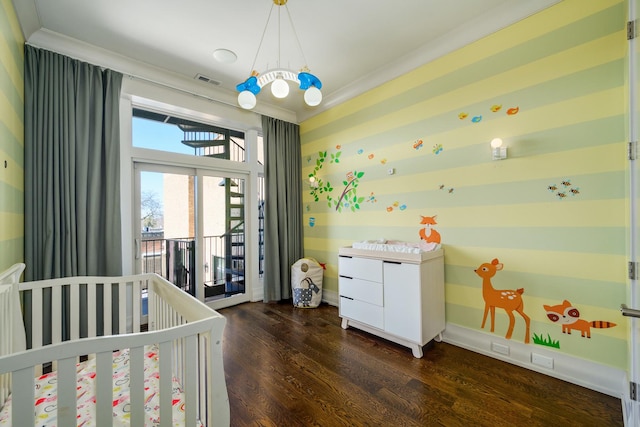 bedroom featuring crown molding, visible vents, dark wood-type flooring, access to outside, and baseboards