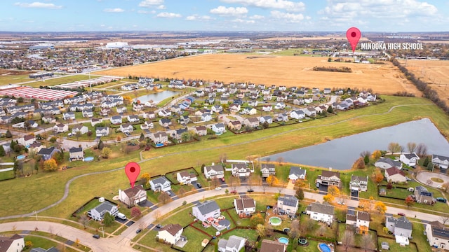 bird's eye view with a water view and a residential view