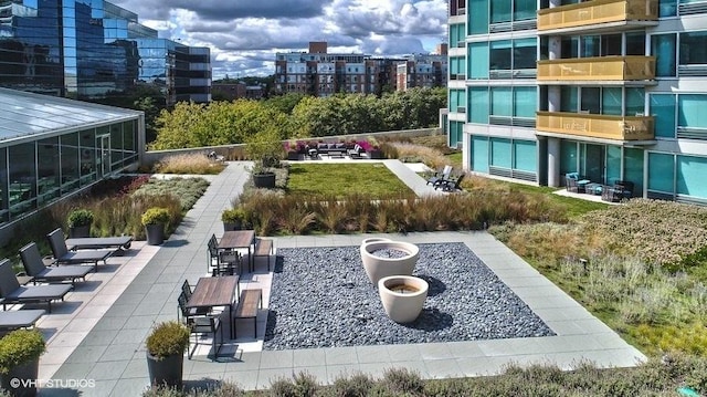 view of property's community with a patio