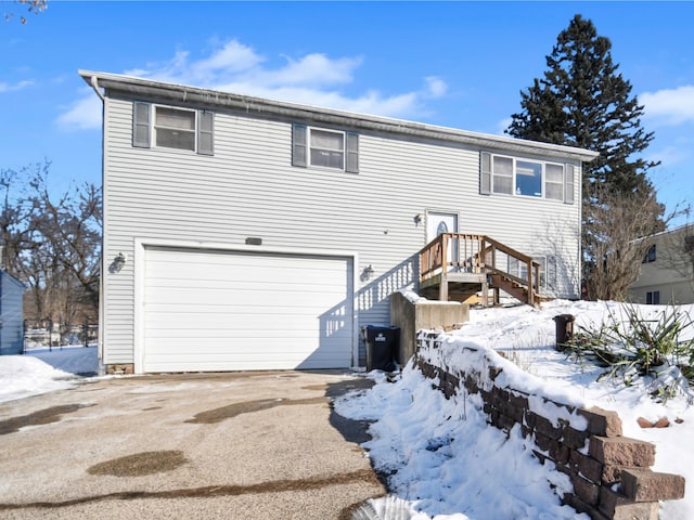 view of front of house with an attached garage and driveway