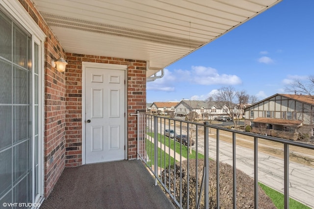 balcony featuring a residential view