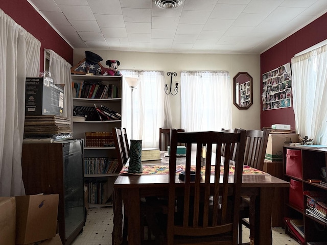 dining room with visible vents and tile patterned floors