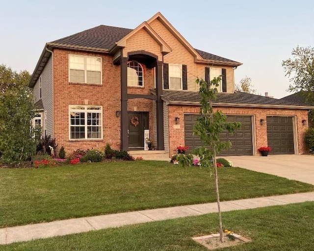 view of front of property featuring driveway, a front yard, and brick siding