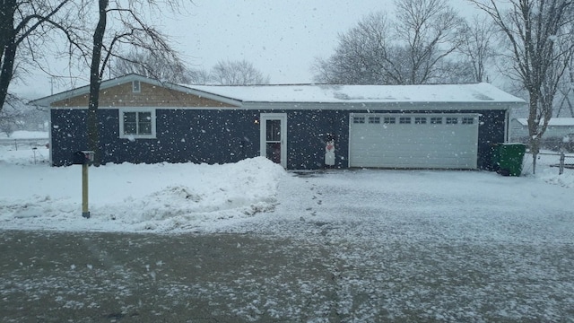 single story home with an attached garage