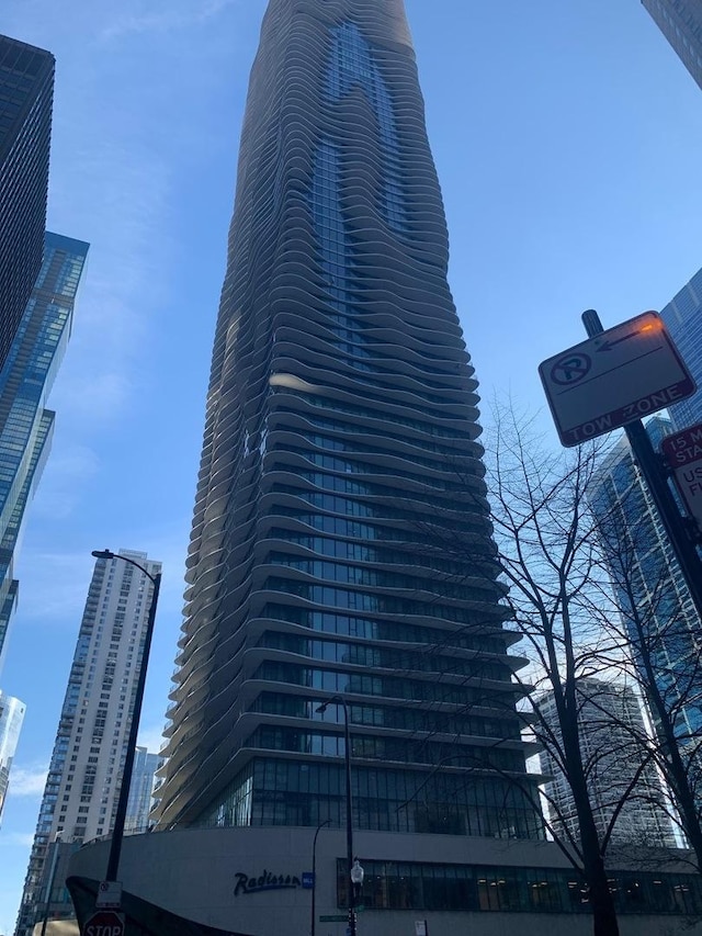 view of building exterior featuring a view of city