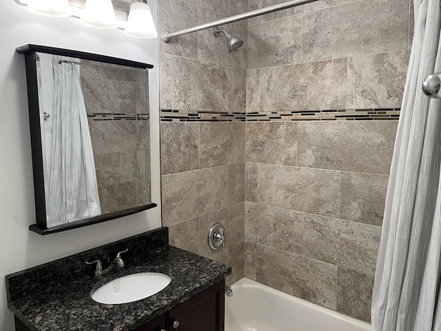 full bath with shower / bath combo with shower curtain and vanity